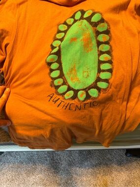 Authentic Orange Short-Sleeve Tee with Green Graphic